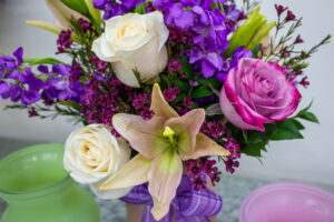 Roses and Lilies in an arrangment with extra vases